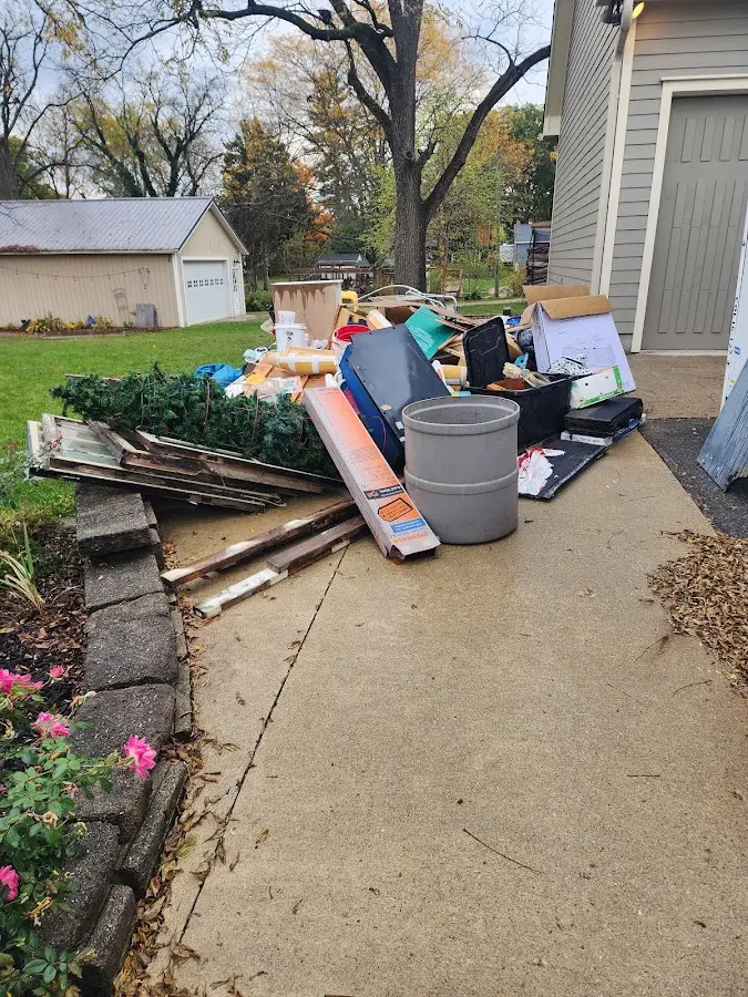 Dumpster being loaded with debris for 12 Yard Dumpster Rental in Santa Ynez